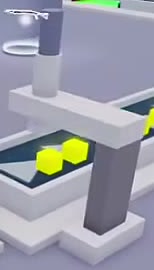 Starting Dropper with a white arm and gray support beside the conveyor.