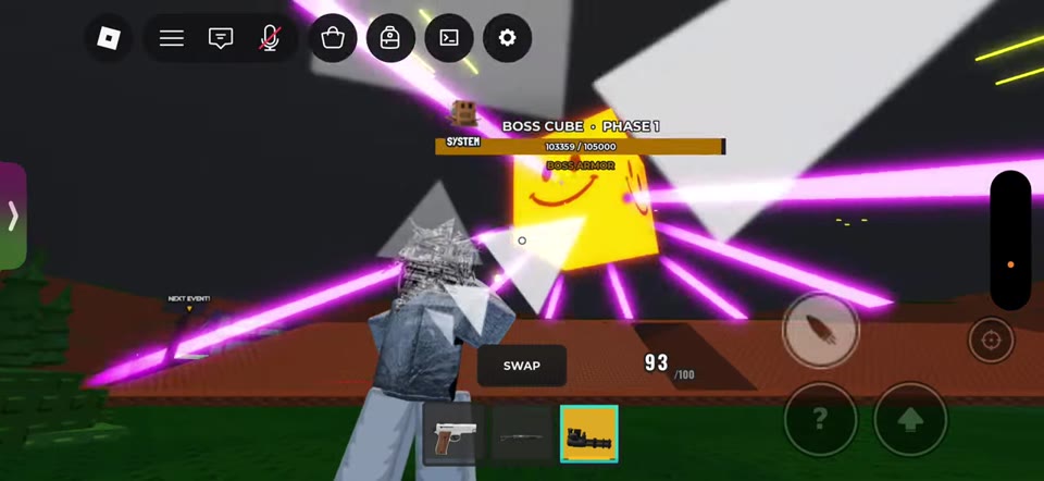 Player aiming upward at the yellow Boss Cube, with its phase label, health bar, and mobile fire button visible.